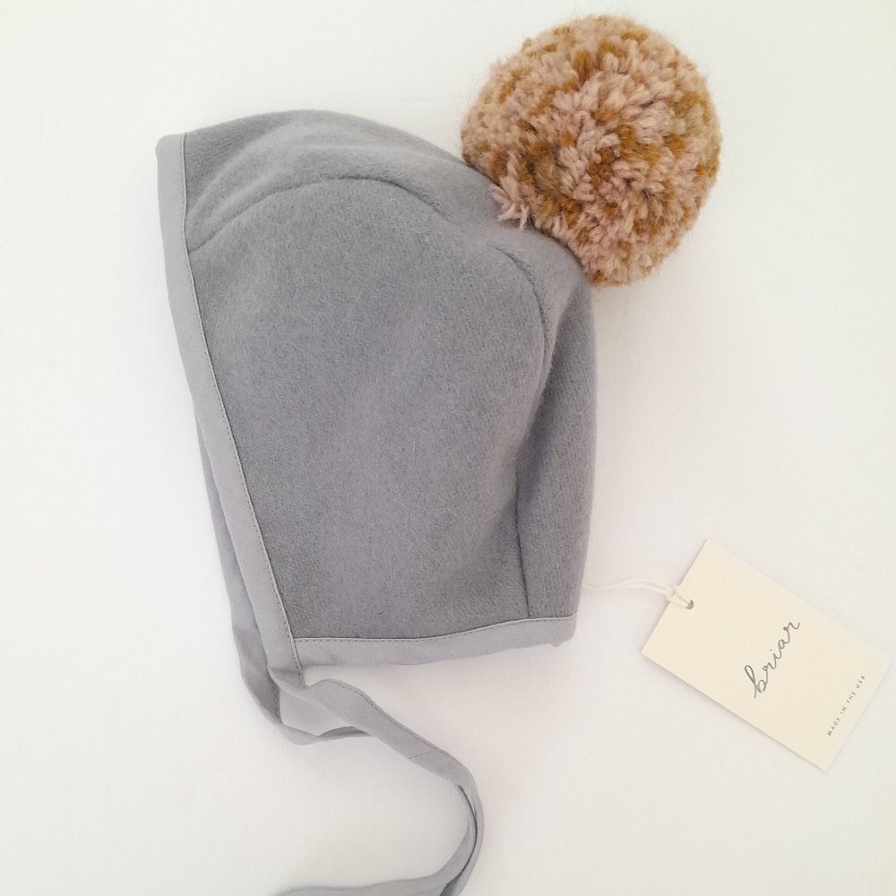 Limited additional pom bonnet